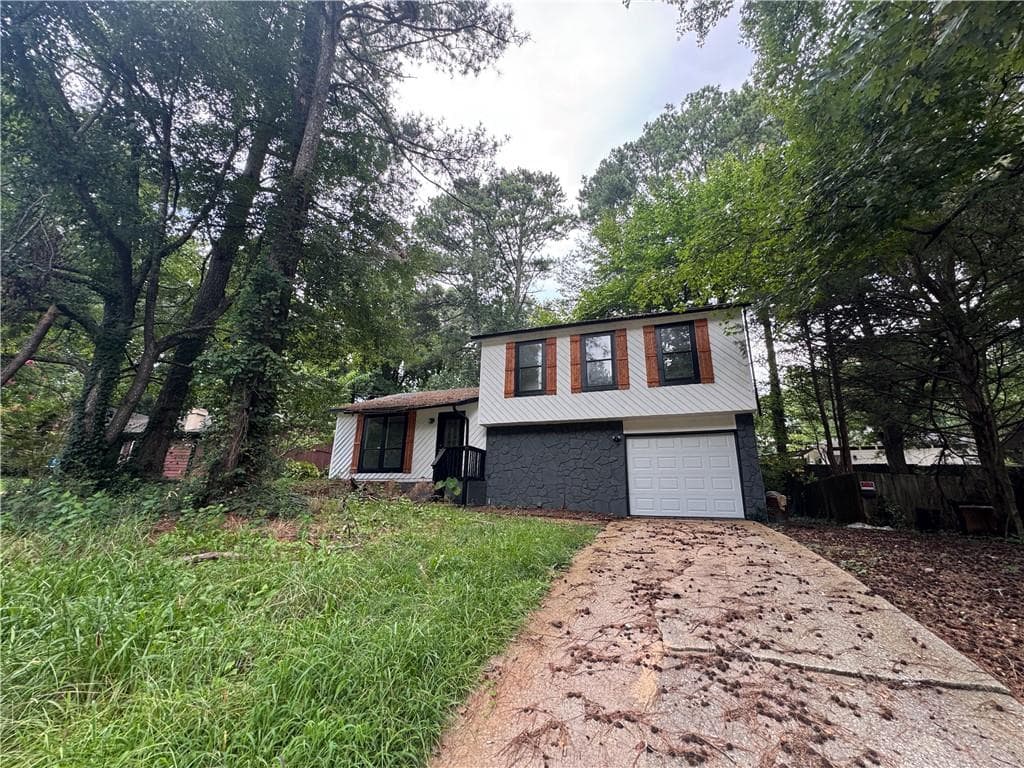 3 bedroom, 2 bathroom, 1,430 sq ft single family residence for sale at 3852 W Wood Path, Stone Mountain, GA 30083