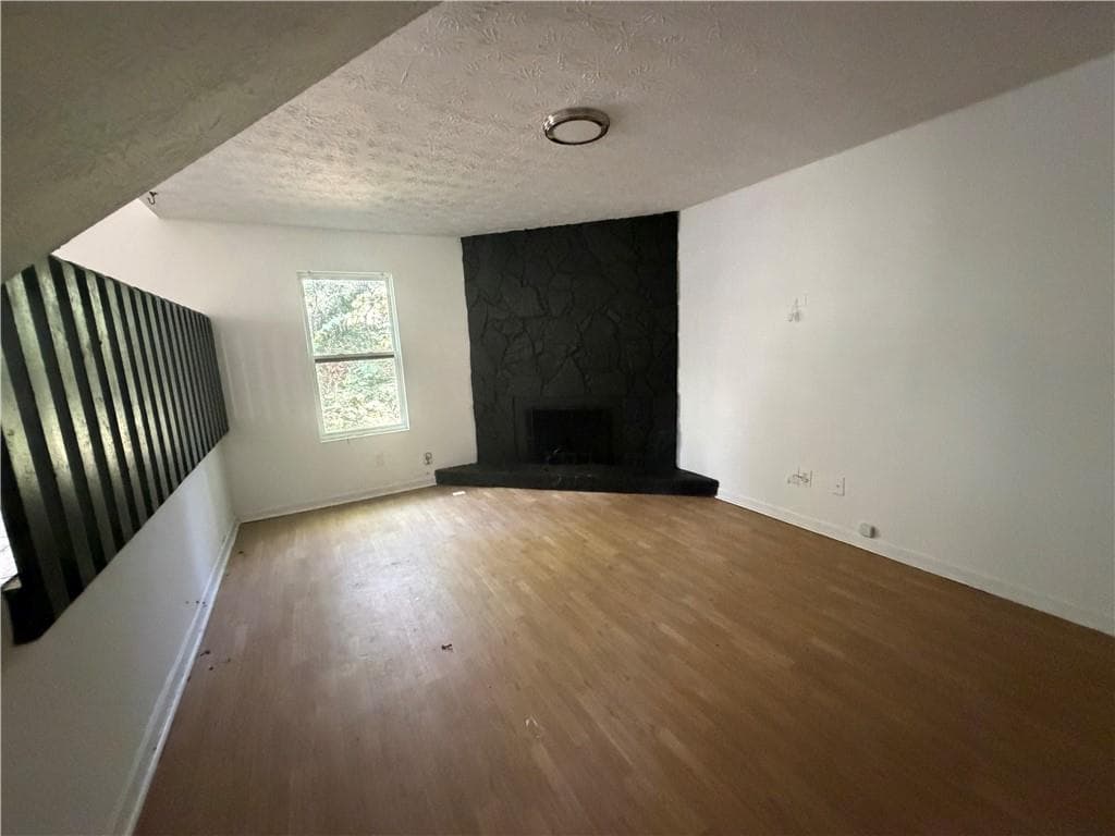 3 bedroom, 2 bathroom, 1,430 sq ft single family residence for sale at 3852 W Wood Path, Stone Mountain, GA 30083 — photo 3