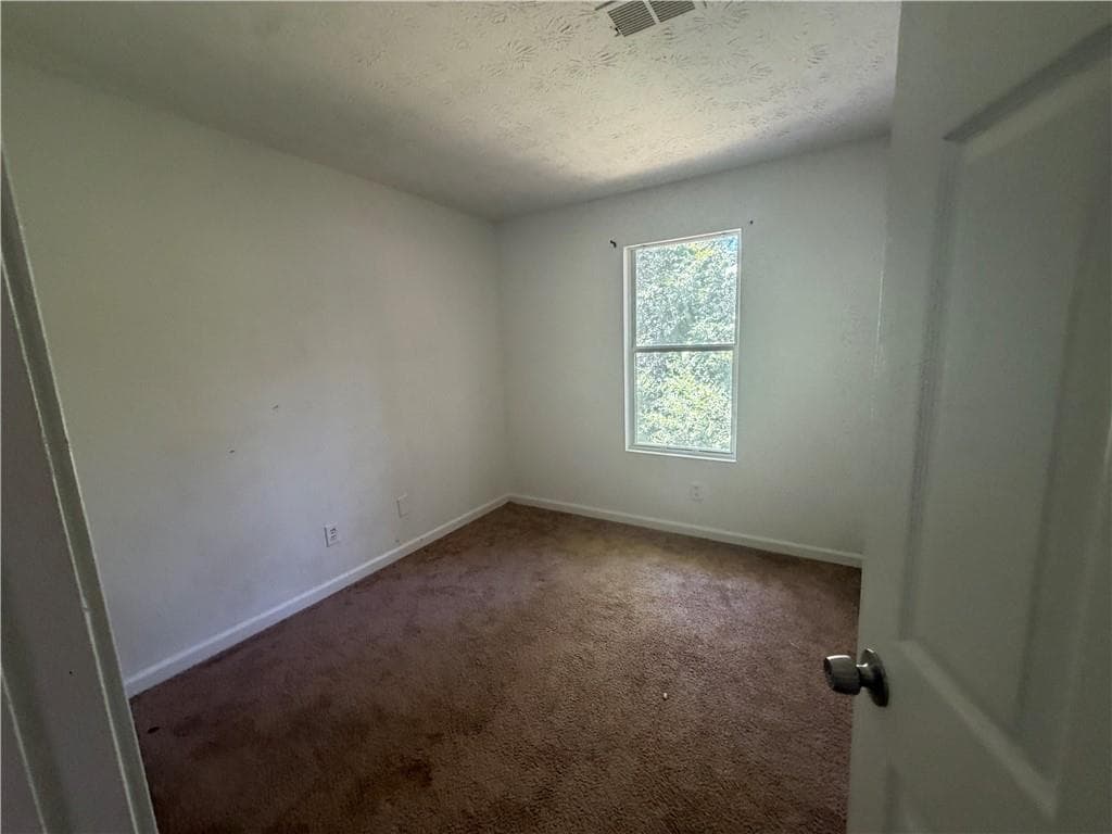 3 bedroom, 2 bathroom, 1,430 sq ft single family residence for sale at 3852 W Wood Path, Stone Mountain, GA 30083 — photo 4