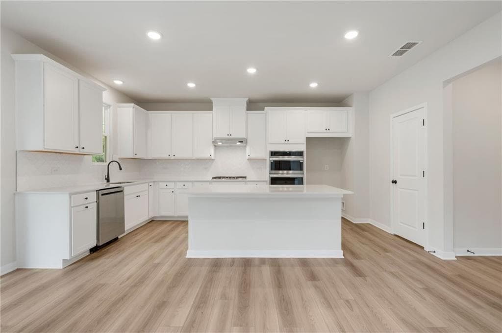 5 bedroom, 3 bathroom, 2,987 sq ft single family residence for sale at 136 Serenade Creek Road, Mcdonough, GA 30252 — photo 7