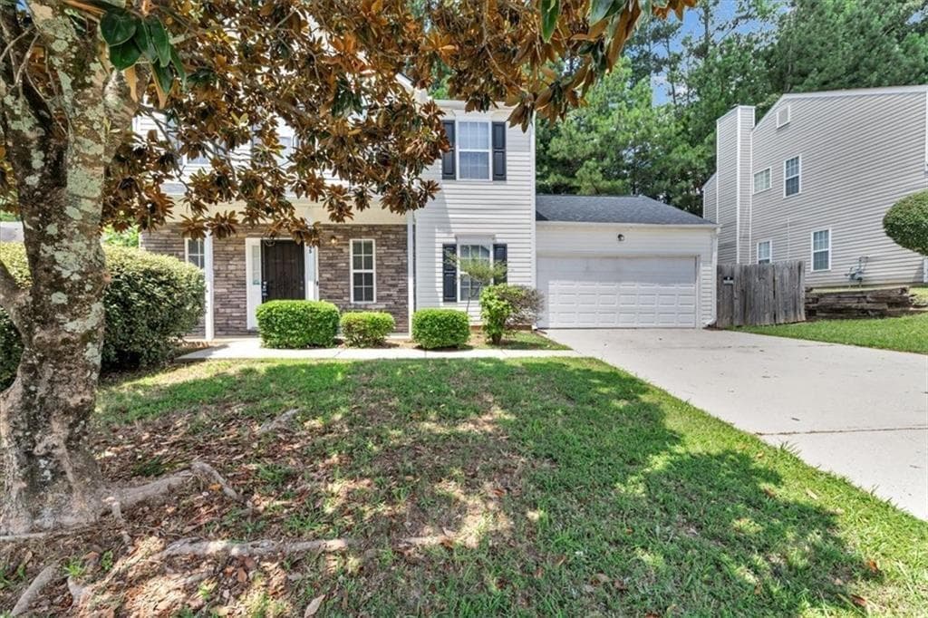 3 bedroom, 3 bathroom, 1,640 sq ft single family residence for rent at 5745 Old Carriage Drive, Atlanta, GA 30349 for $2,100 a month — photo 2