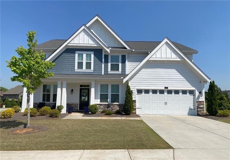 5 bedroom, 3 bathroom, 3,225 sq ft single family residence for sale at 13 Candlewood Lane, Hoschton, GA 30548 — photo 1 of 58