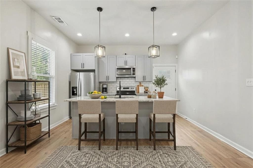 3 bedroom, 2 bathroom, 1,405 sq ft single family residence for sale at 31 Mildred Place NW, Atlanta, GA 30318 — photo 3