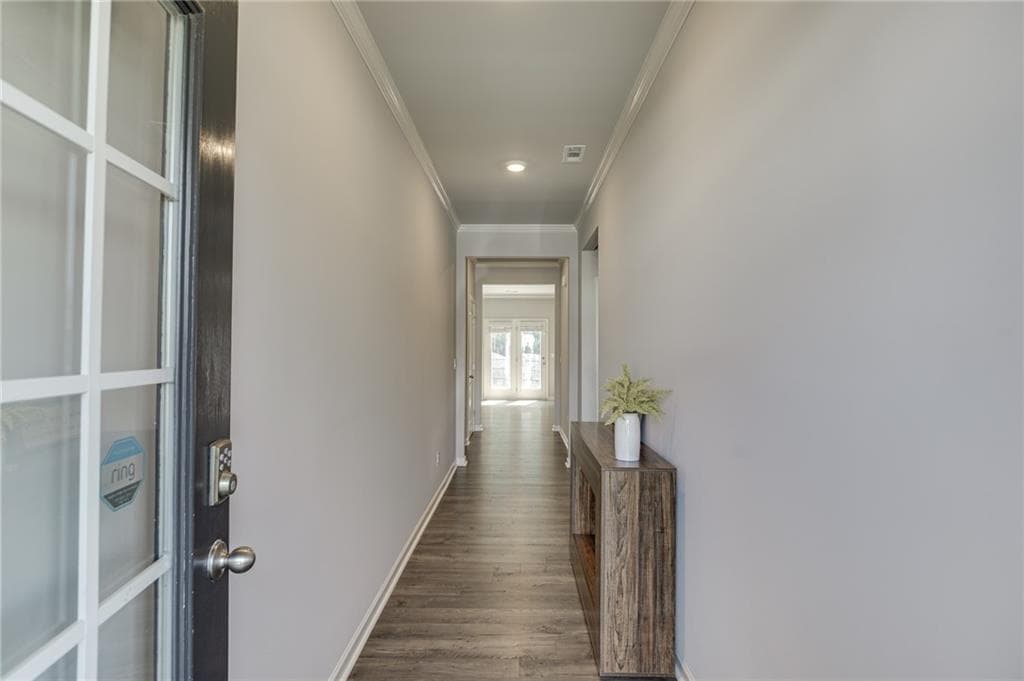5 bedroom, 3 bathroom, 2,788 sq ft single family residence for sale at 6078 Trumpet Flower Avenue, Flowery Branch, GA 30542 — photo 4
