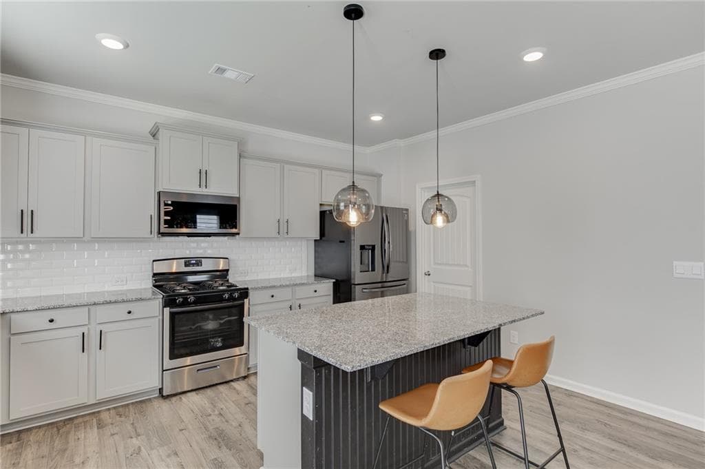 5 bedroom, 3 bathroom, 2,788 sq ft single family residence for sale at 6078 Trumpet Flower Avenue, Flowery Branch, GA 30542 — photo 8