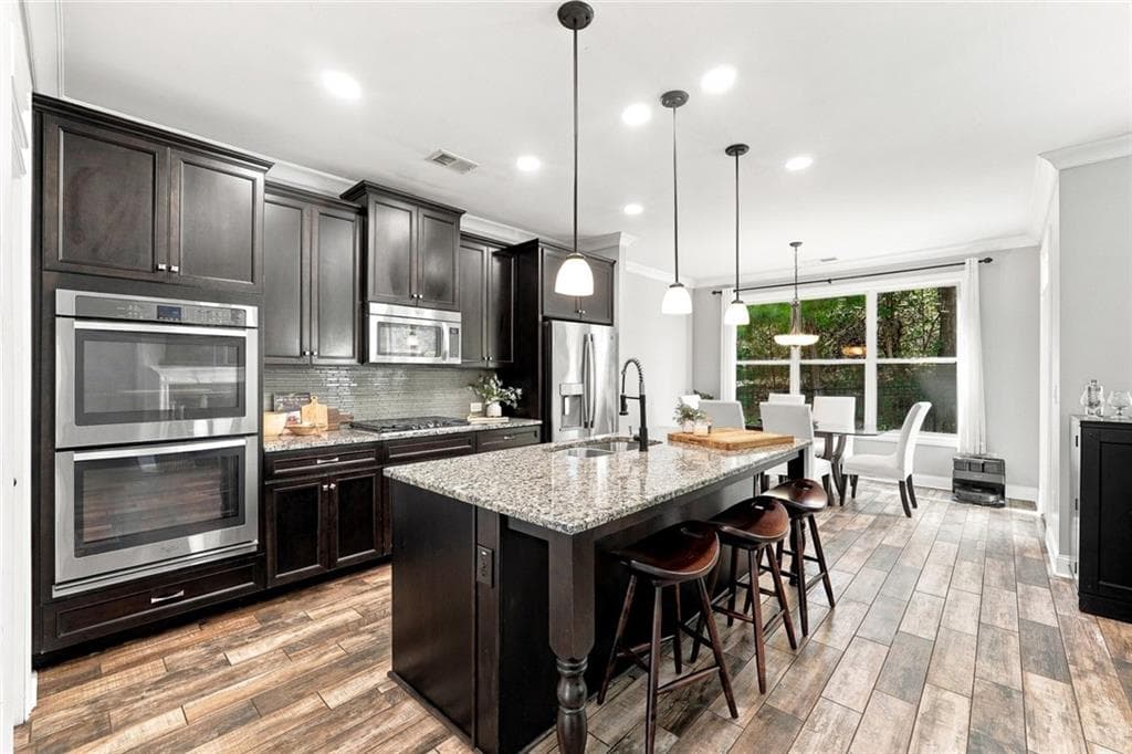 3 bedroom, 3 bathroom, 2,665 sq ft single family residence for sale at 7190 Jamestown Drive, Alpharetta, GA 30005 — photo 9