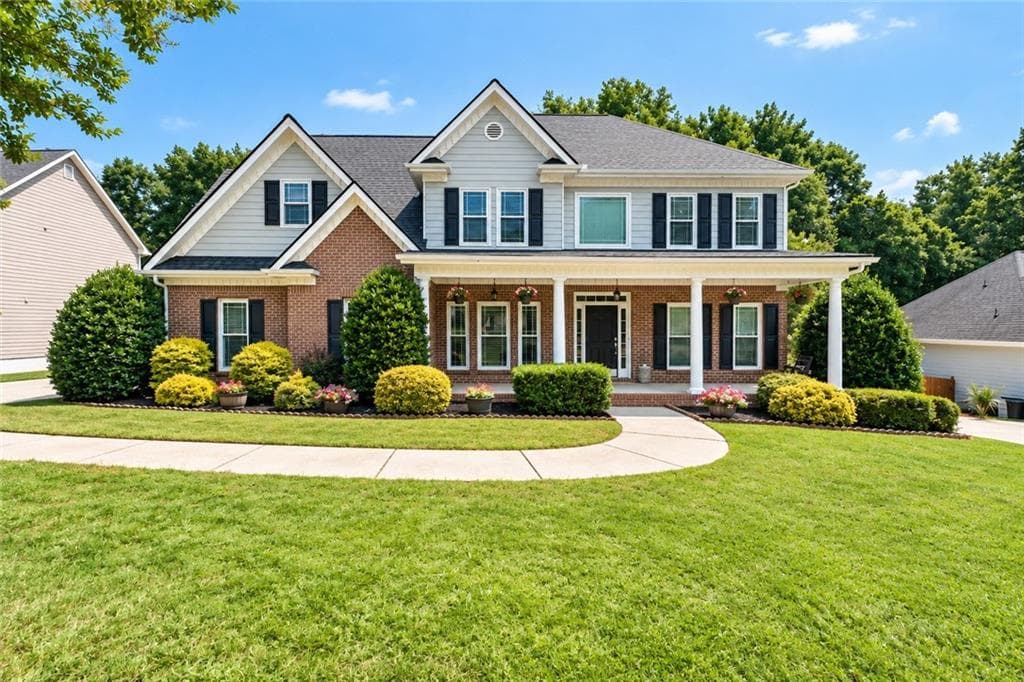 5 bedroom, 3 bathroom, 4,550 sq ft single family residence for sale at 1169 Vintage Way, Hoschton, GA 30548 — photo 2
