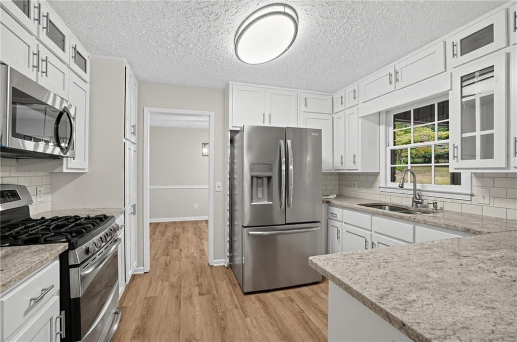 4 bedroom, 3 bathroom, 2,104 sq ft single family residence for sale at 130 Kay Circle, Covington, GA 30014 — photo 6