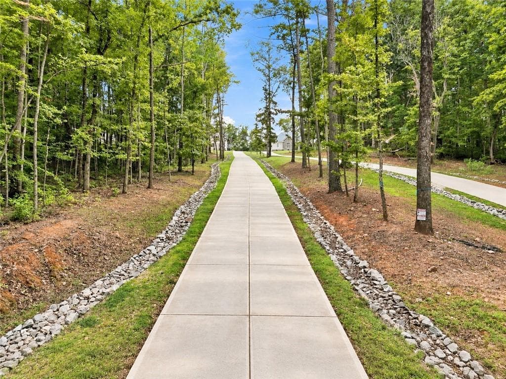4 bedroom, 3 bathroom, 6,018 sq ft single family residence for sale at 569 Byrd Mountain Lane, Canton, GA 30114 — photo 2