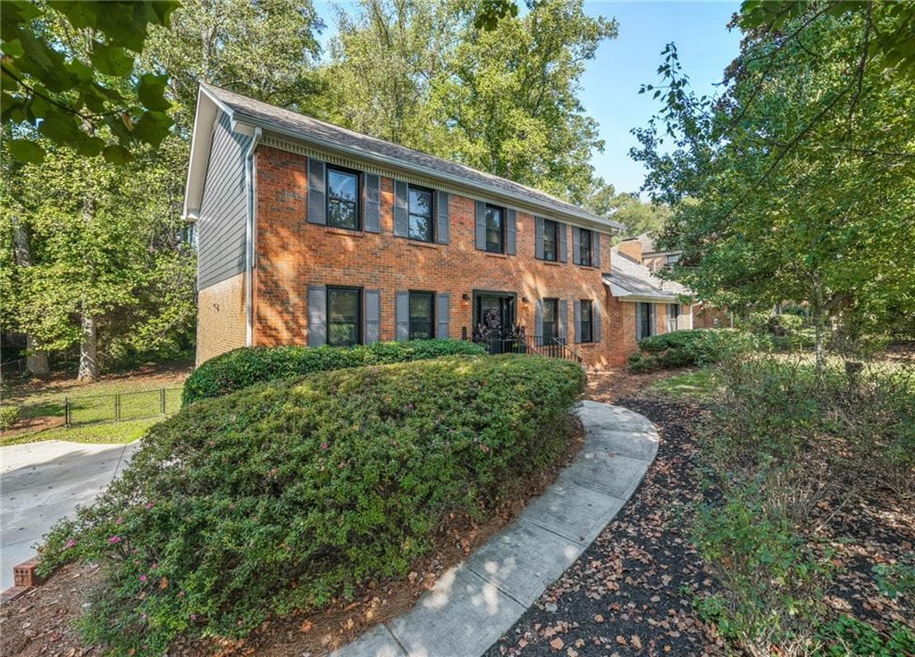 4 bedroom, 3 bathroom, 3,111 sq ft single family residence for sale at 831 Montego Way, Lilburn, GA 30047 — photo 1 of 48