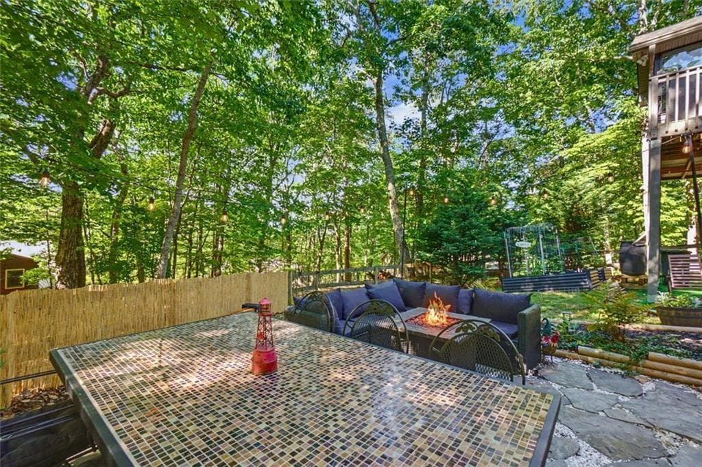 3 bedroom, 2 bathroom, 1,555 sq ft single family residence for sale at 80 Camelot Way, Jasper, GA 30143 — photo 4