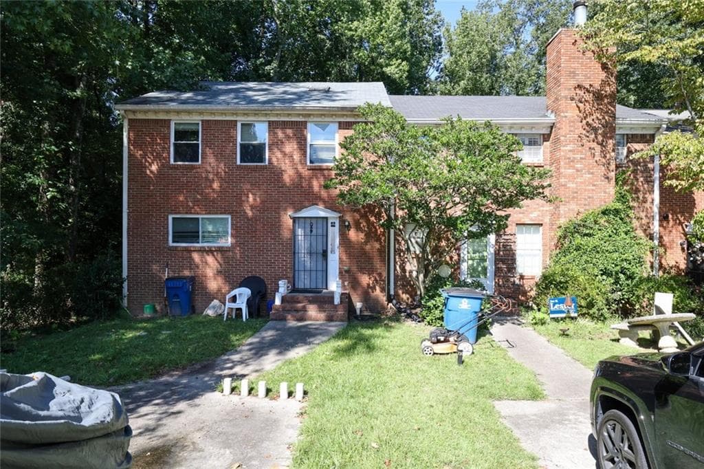 2 bedroom, 4 bathroom, 1,920 sq ft townhouse for sale at 7135 Williamsburg Drive, Riverdale, GA 30274