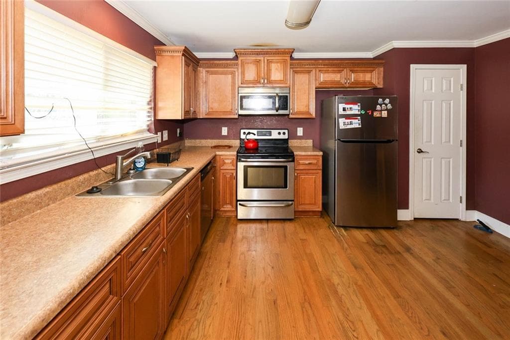 2 bedroom, 4 bathroom, 1,920 sq ft townhouse for sale at 7135 Williamsburg Drive, Riverdale, GA 30274 — photo 5