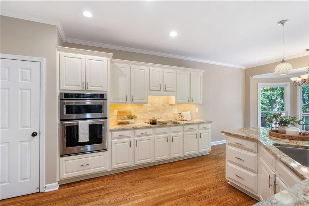 6 bedroom, 5 bathroom, 4,074 sq ft single family residence for sale at 135 Grand Avenue, Suwanee, GA 30024 — photo 10
