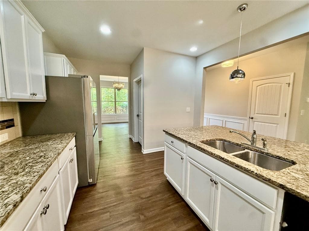 5 bedroom, 3 bathroom, 3,353 sq ft single family residence for sale at 5190 Amberland Square, Atlanta, GA 30349 — photo 5