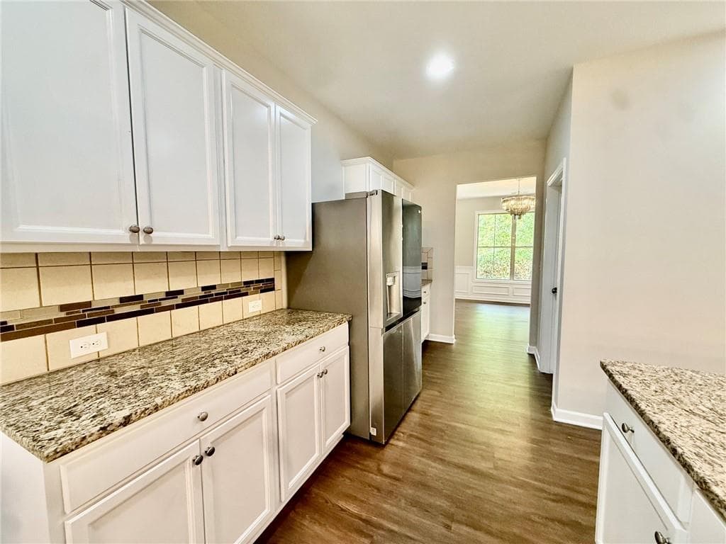 5 bedroom, 3 bathroom, 3,353 sq ft single family residence for sale at 5190 Amberland Square, Atlanta, GA 30349 — photo 7