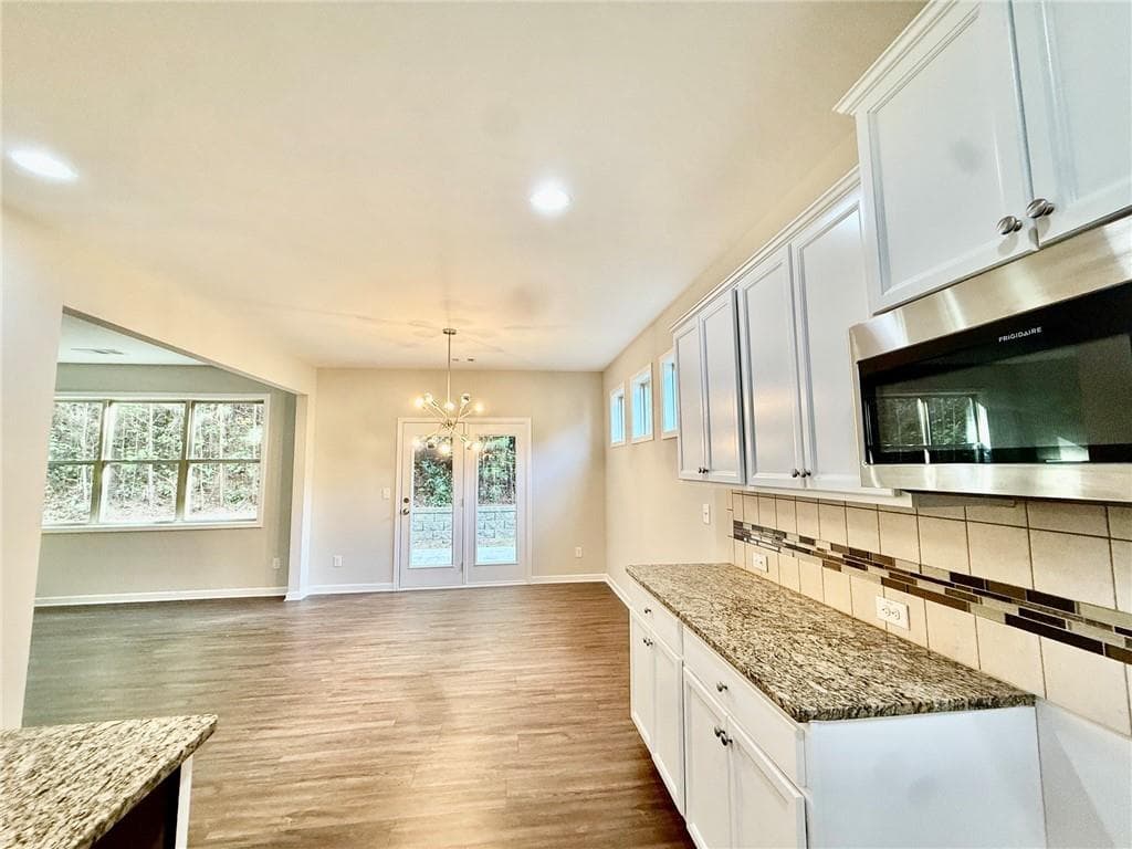 5 bedroom, 3 bathroom, 3,353 sq ft single family residence for sale at 5190 Amberland Square, Atlanta, GA 30349 — photo 9