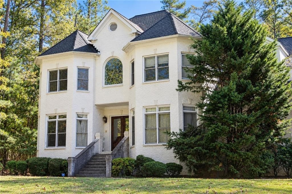 7 bedroom, 5 bathroom, 5,872 sq ft single family residence under contract at 3930 Demooney Road, Atlanta, GA 30349 — photo 2