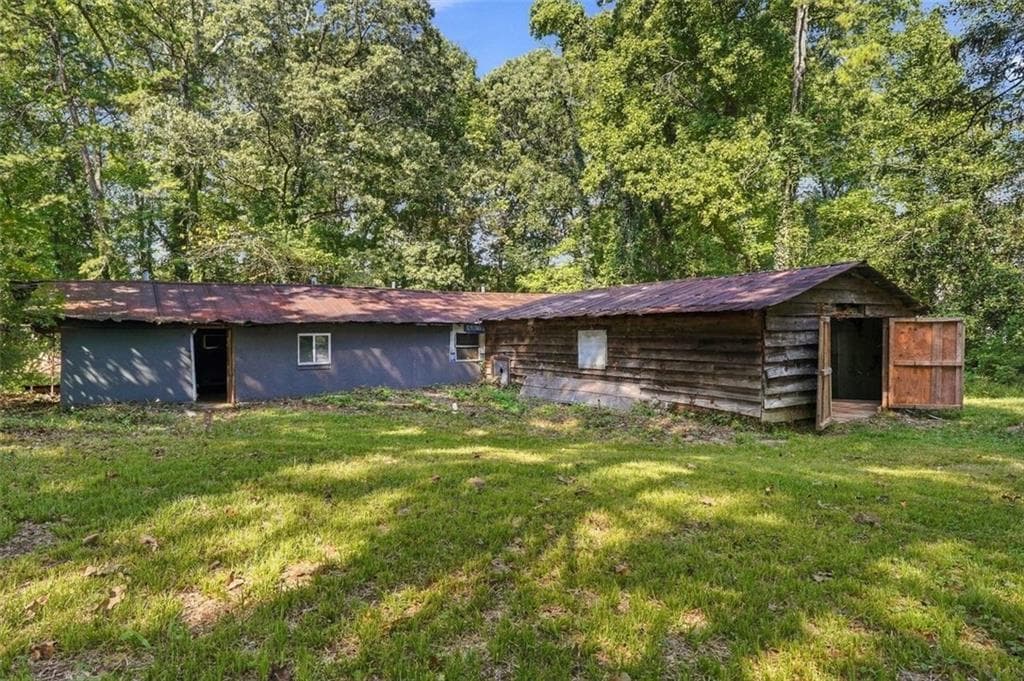 4 bedroom, 1 bathroom, 1,290 sq ft single family residence for sale at 5884 Rockbridge Road, Stone Mountain, GA 30087 — photo 7