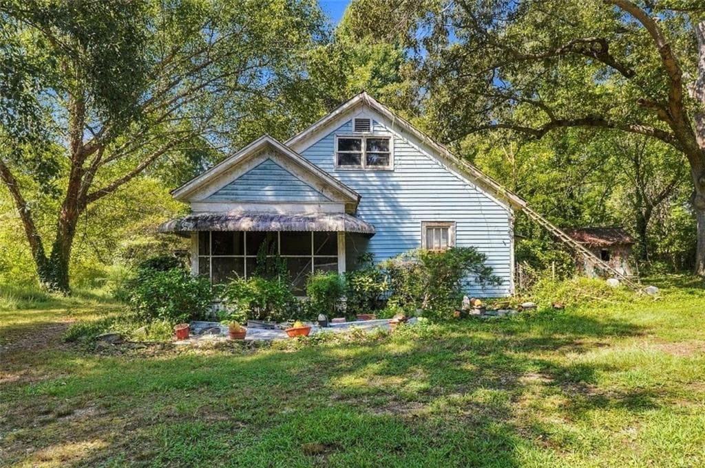4 bedroom, 1 bathroom, 1,290 sq ft single family residence for sale at 5884 Rockbridge Road, Stone Mountain, GA 30087 — photo 3