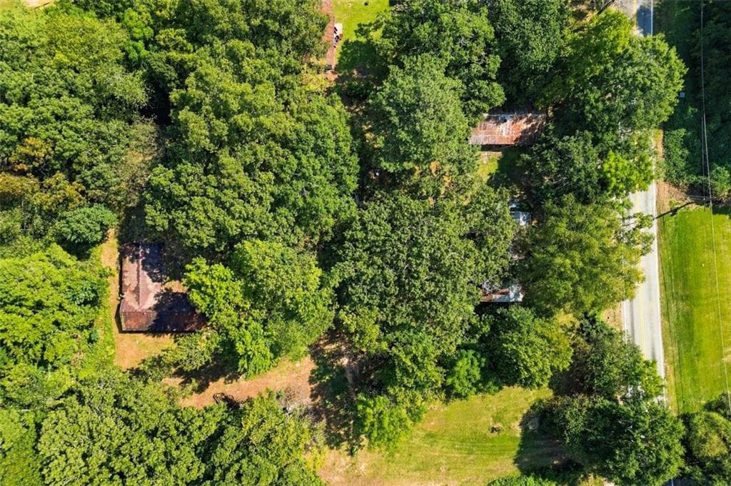 4 bedroom, 1 bathroom, 1,290 sq ft single family residence for sale at 5884 Rockbridge Road, Stone Mountain, GA 30087 — photo 2