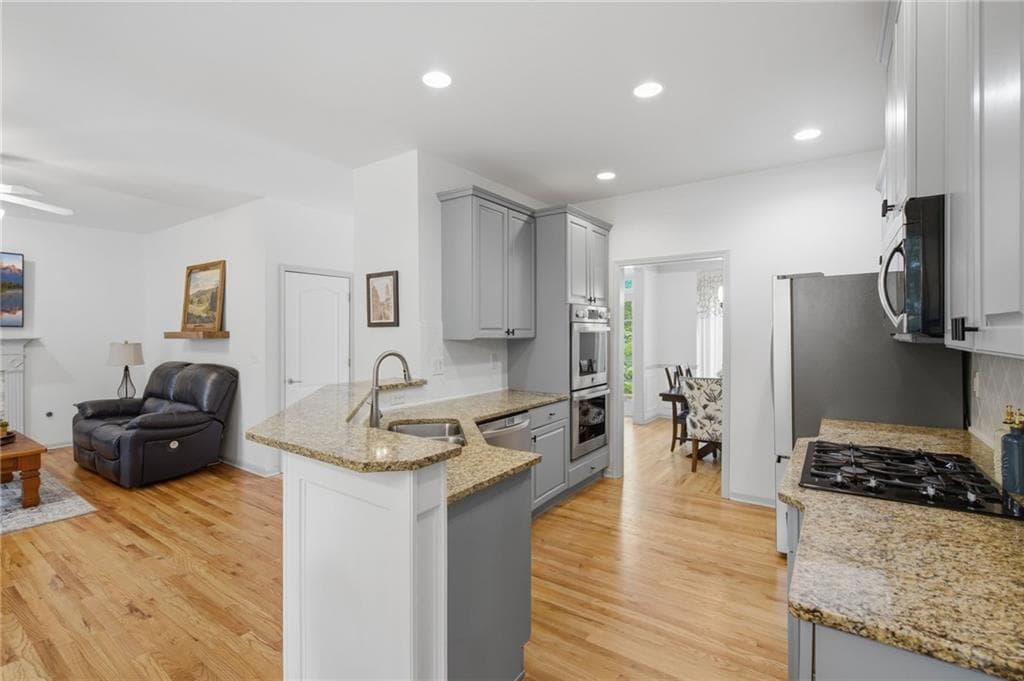 5 bedroom, 4 bathroom, 3,356 sq ft single family residence for sale at 4092 Suwanee Mill Drive, Buford, GA 30518 — photo 7