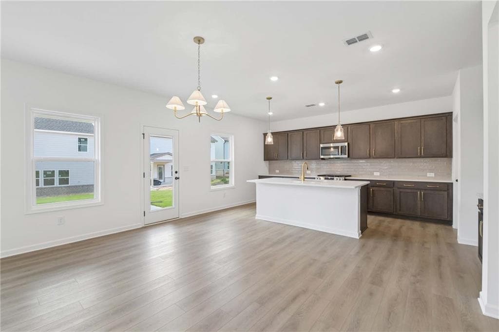 5 bedroom, 4 bathroom, 2,587 sq ft single family residence for sale at 5448 Hargrove Way, Flowery Branch, GA 30542 — photo 9
