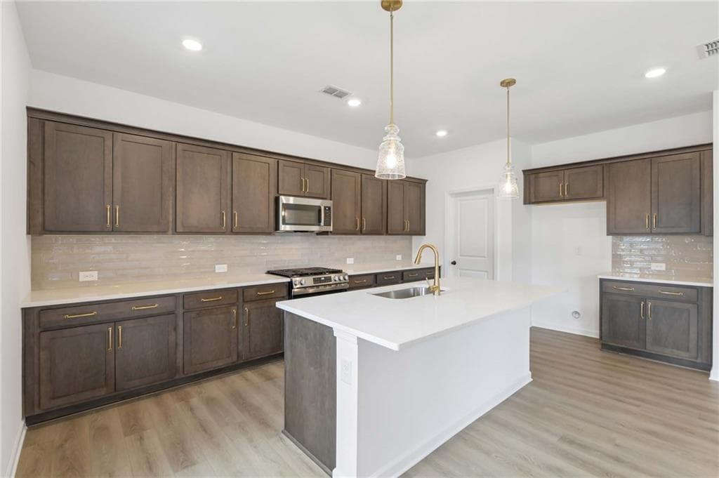 5 bedroom, 4 bathroom, 2,587 sq ft single family residence for sale at 5448 Hargrove Way, Flowery Branch, GA 30542 — photo 10