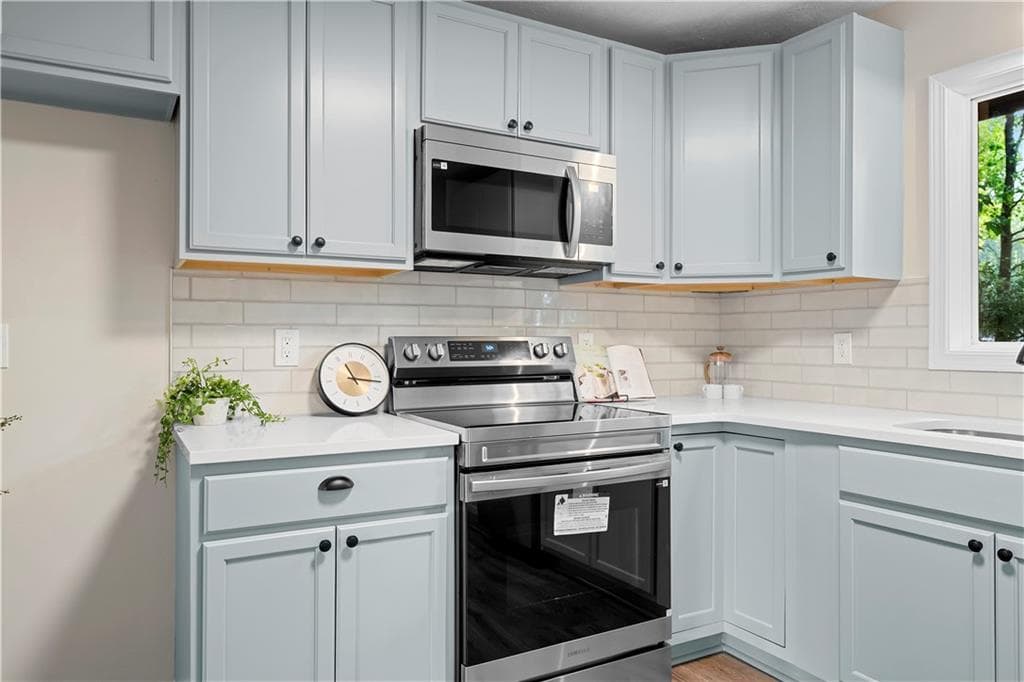 4 bedroom, 3 bathroom, 1,633 sq ft single family residence for sale at 1197 Wynbrook Road, Marietta, GA 30008 — photo 3