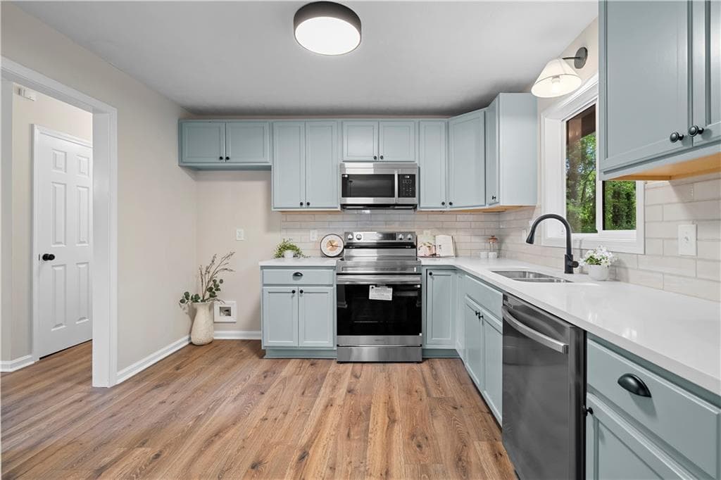 4 bedroom, 3 bathroom, 1,633 sq ft single family residence for sale at 1197 Wynbrook Road, Marietta, GA 30008 — photo 5