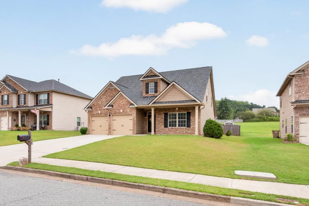 4 bedroom, 3 bathroom, 2,742 sq ft single family residence for sale at 5045 Bucknell Trace, Cumming, GA 30028 — photo 3