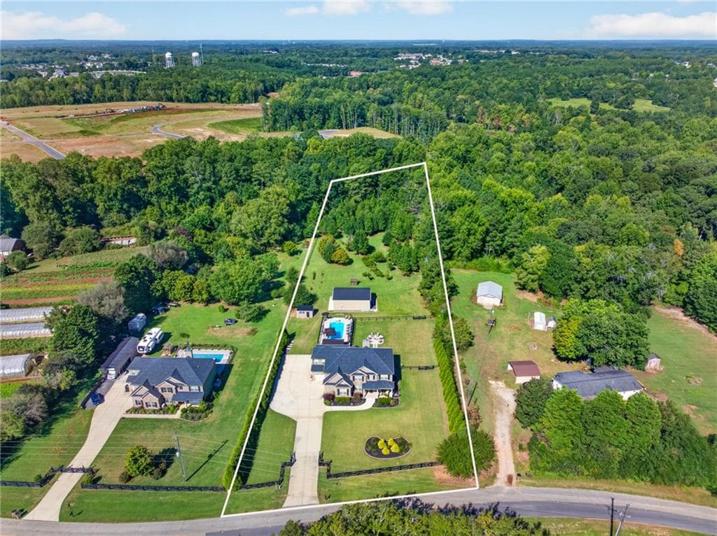 5 bedroom, 4 bathroom, 3,926 sq ft single family residence under contract at 415 Skelton Road, Hoschton, GA 30548