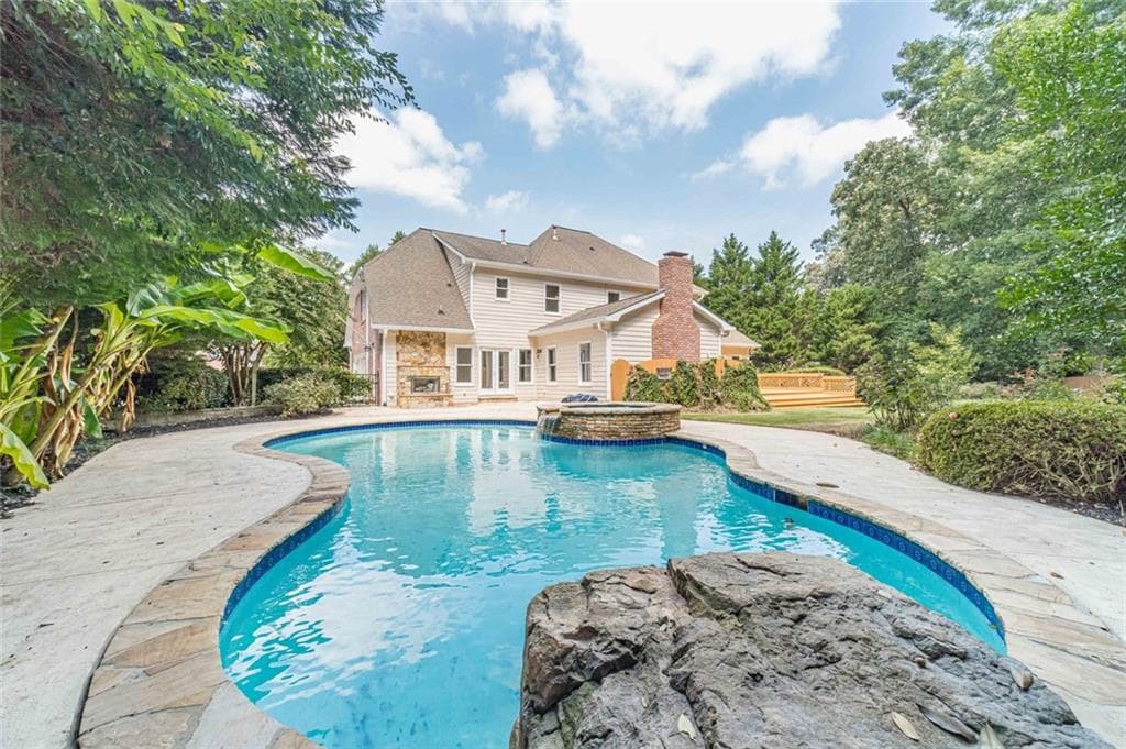 5 bedroom, 5 bathroom, 6,258 sq ft single family residence for sale at 4400 Sirrocco Lane, Lilburn, GA 30047 — photo 2