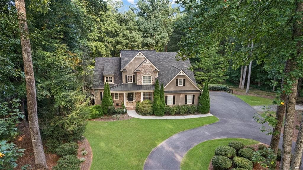 5 bedroom, 5 bathroom, 6,089 sq ft single family residence for sale at 5040 John Burruss Road, Cumming, GA 30040 — photo 3
