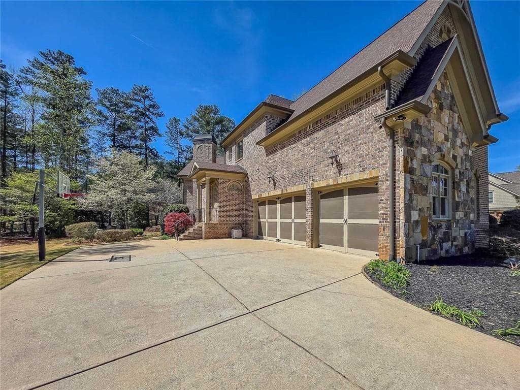 5 bedroom, 5 bathroom, 5,886 sq ft single family residence for sale at 1485 White Rose Court, Kennesaw, GA 30152 — photo 4