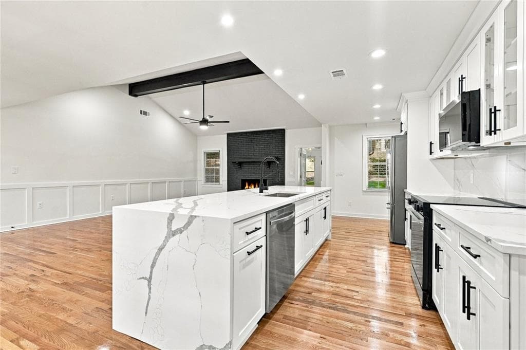 7 bedroom, 5 bathroom, 4,613 sq ft single family residence for sale at 1761 E Gate Drive, Stone Mountain, GA 30087 — photo 4