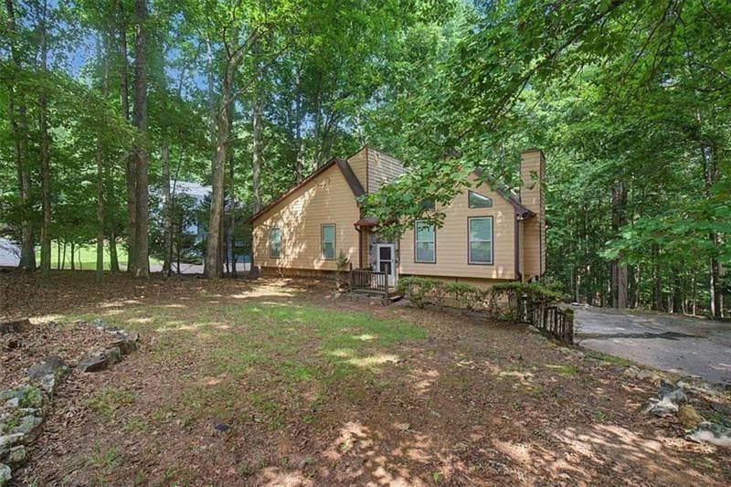 3 bedroom, 2 bathroom, 1,834 sq ft single family residence for sale at 380 N Victoria Road, Woodstock, GA 30189 — photo 4