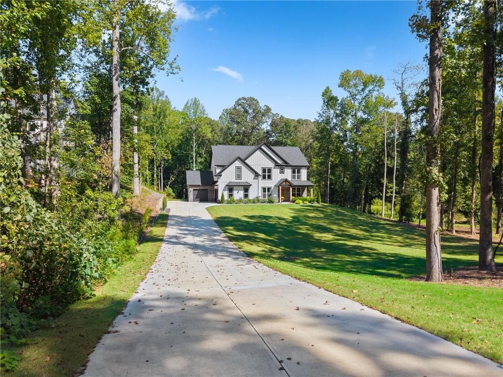 5 bedroom, 4 bathroom, 4,537 sq ft single family residence for sale at 1144 Lexington Ridge Road, Hoschton, GA 30548 — photo 4