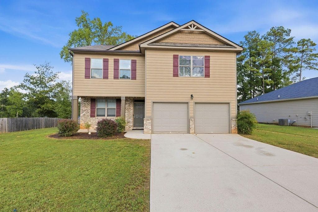 4 bedroom, 3 bathroom, 2,467 sq ft single family residence for sale at 9430 Bandywood Drive, Covington, GA 30014 — photo 1 of 36