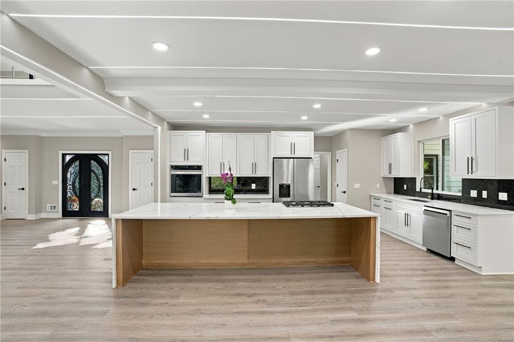 6 bedroom, 4 bathroom, 4,150 sq ft single family residence for sale at 4508 Bankside Court, Marietta, GA 30066 — photo 7