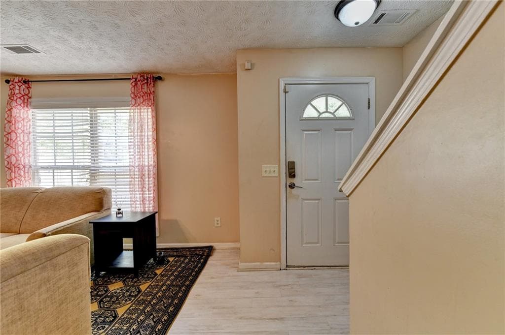 5 bedroom, 4 bathroom, 2,020 sq ft single family residence for sale at 735 Castlebrooke Way, Lawrenceville, GA 30045 — photo 5