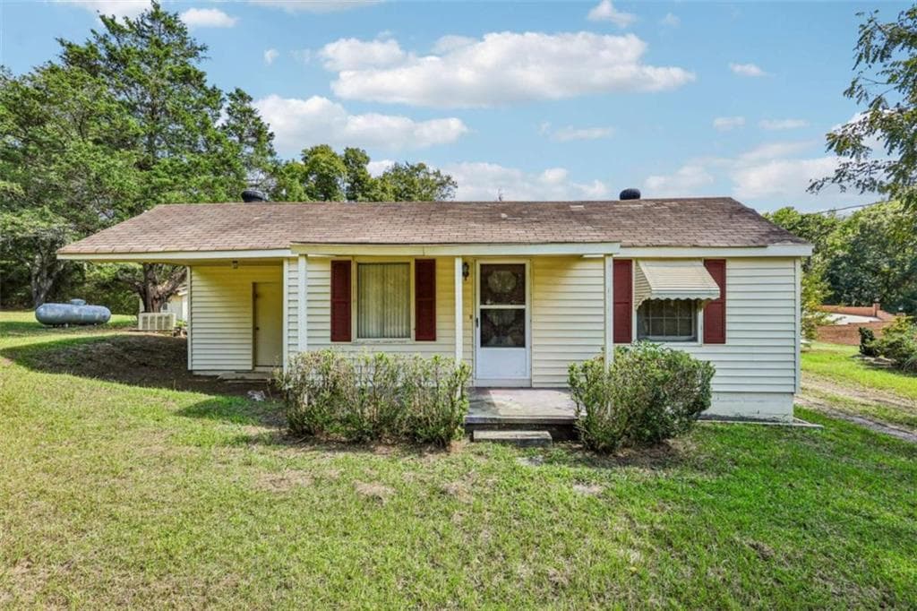 2 bedroom, 1 bathroom, 1,100 sq ft single family residence for sale at 8799 Pleasant Hill Road, Lithonia, GA 30058 — photo 1 of 17