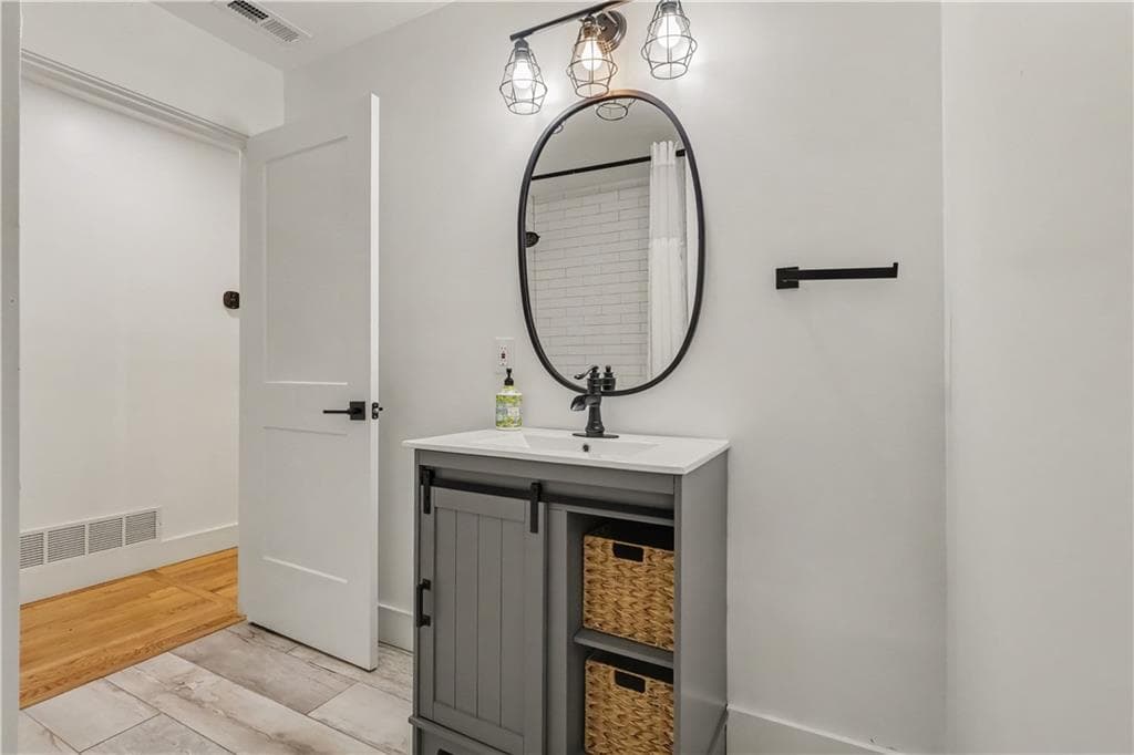 4 bedroom, 3 bathroom, 1,932 sq ft single family residence for sale at 2800 Duke of Gloucester Street, Atlanta, GA 30344 — photo 9
