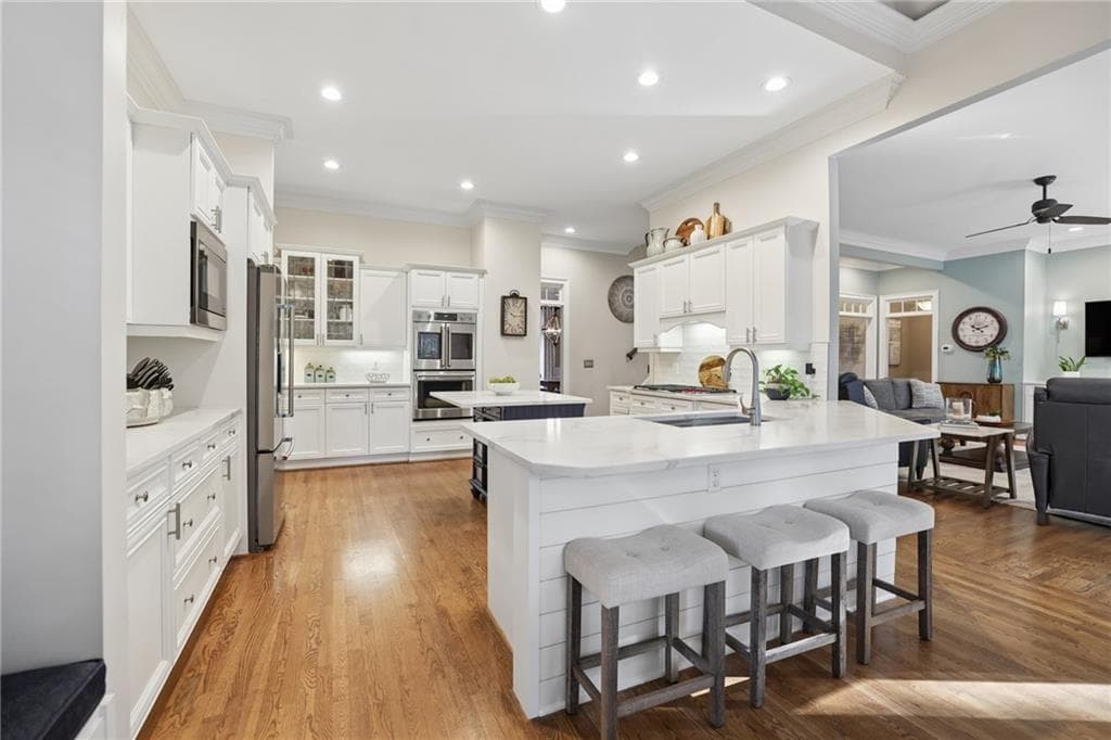 6 bedroom, 5 bathroom, 6,440 sq ft single family residence for sale at 465 W Magnolia Circle, Johns Creek, GA 30005 — photo 9