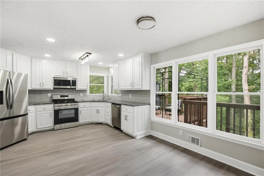5 bedroom, 4 bathroom, 3,850 sq ft single family residence for sale at 2970 Waverly Place Drive, Dacula, GA 30019 — photo 10