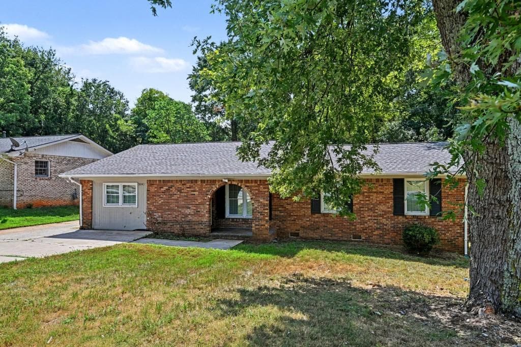 4 bedroom, 2 bathroom, 1,579 sq ft single family residence for sale at 5041 W Mountain Street, Stone Mountain, GA 30083 — photo 2