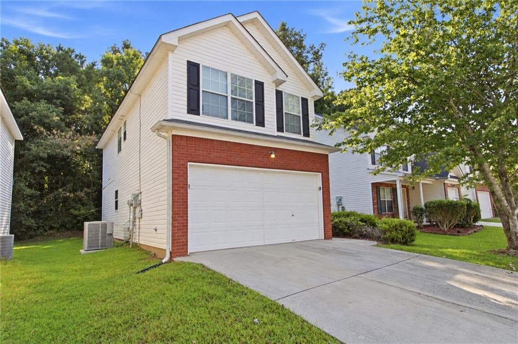 3 bedroom, 3 bathroom, 1,612 sq ft single family residence for sale at 2429 Wood Bend Lane, Riverdale, GA 30296 — photo 2