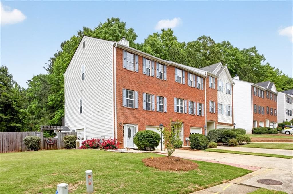 3 bedroom, 4 bathroom, 2,061 sq ft townhouse for sale at 2484 Stonegate Drive, Acworth, GA 30101 — photo 2