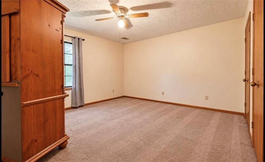 3 bedroom, 2 bathroom, 1,392 sq ft single family residence for sale at 10436 Tara Pointe Drive, Jonesboro, GA 30238 — photo 9
