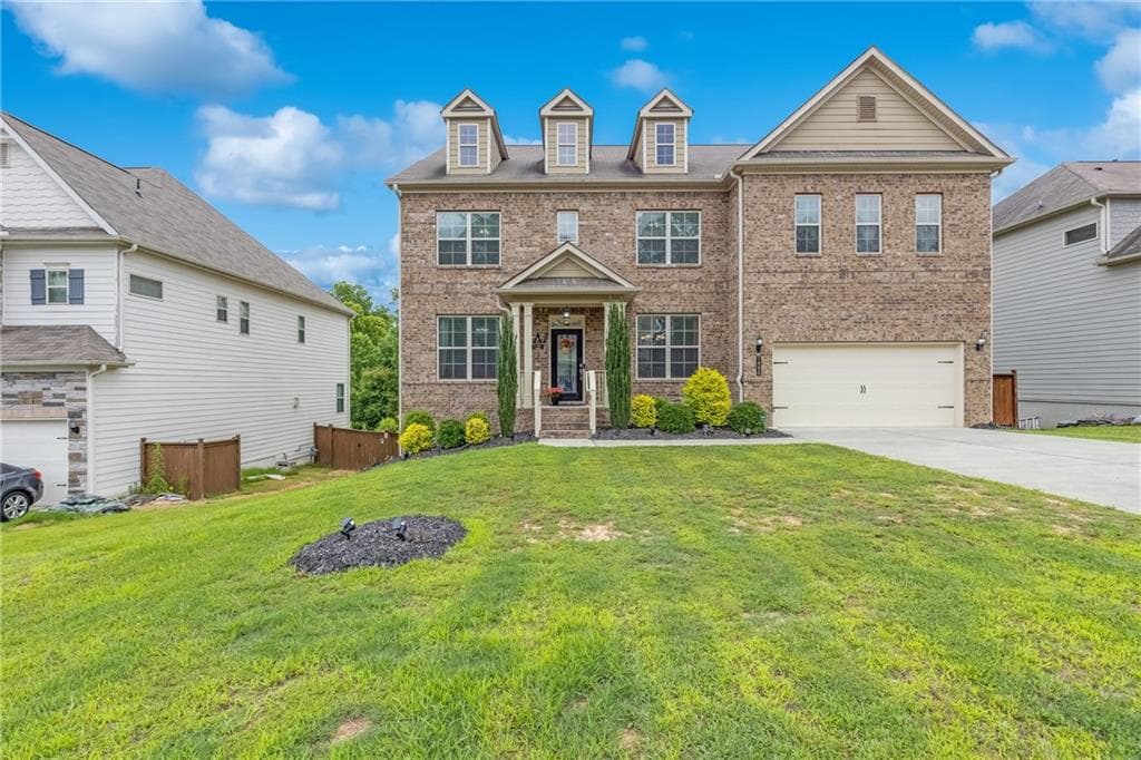 5 bedroom, 4 bathroom, 3,999 sq ft single family residence for sale at 7905 Brewton Creek Drive, Cumming, GA 30028 — photo 1 of 42
